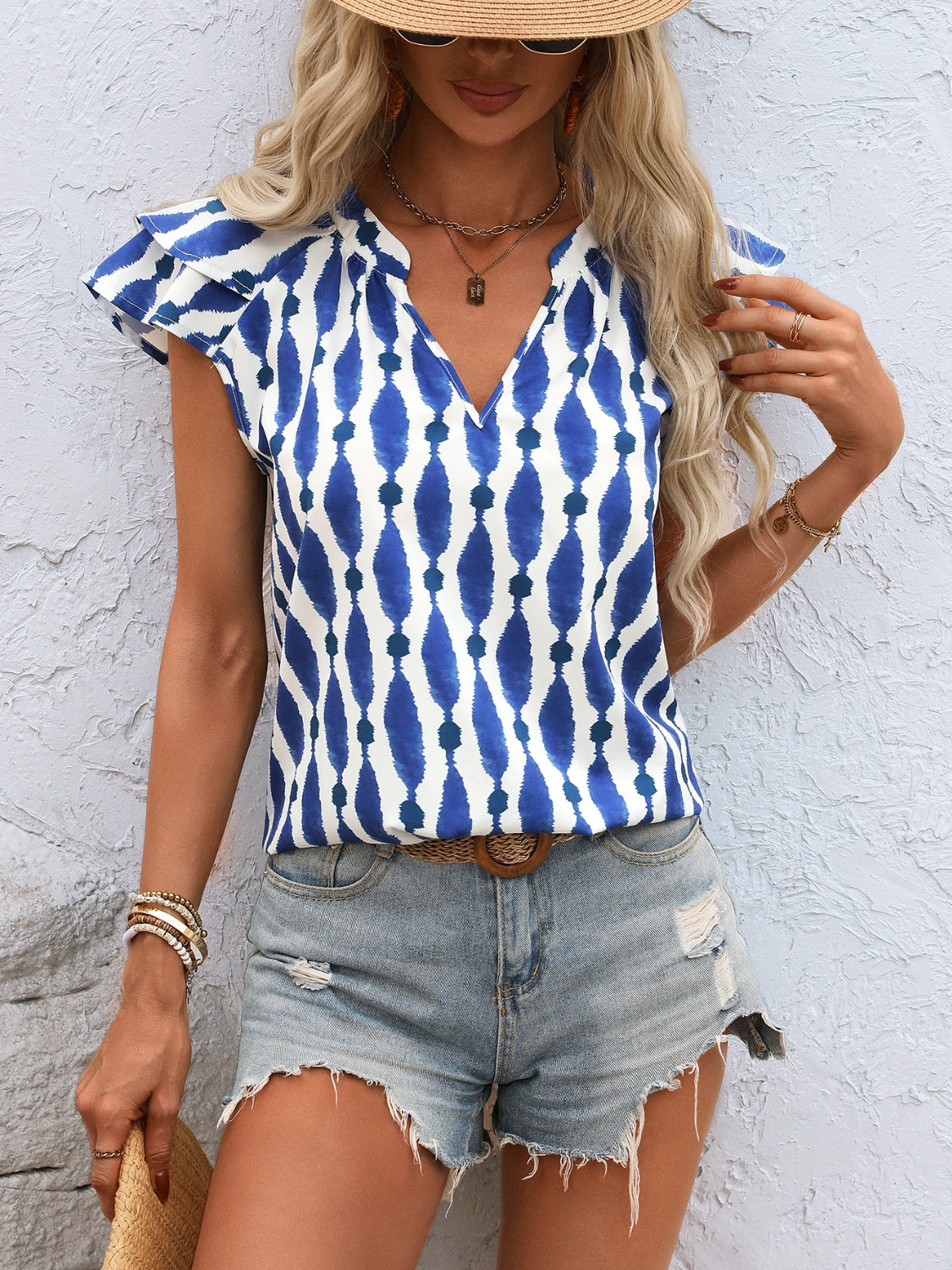 Ruffled Printed Notched Cap Sleeve Blouse