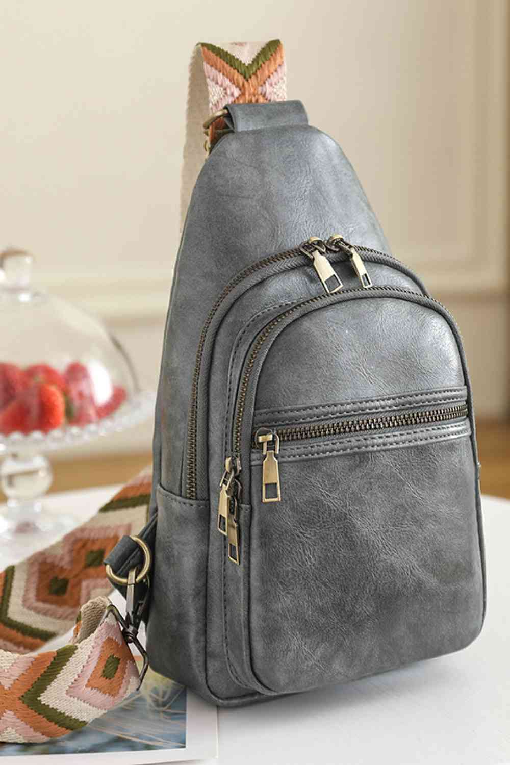 Faux Leather Sling Backpack